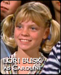 LORI BUSK 
as Caroline